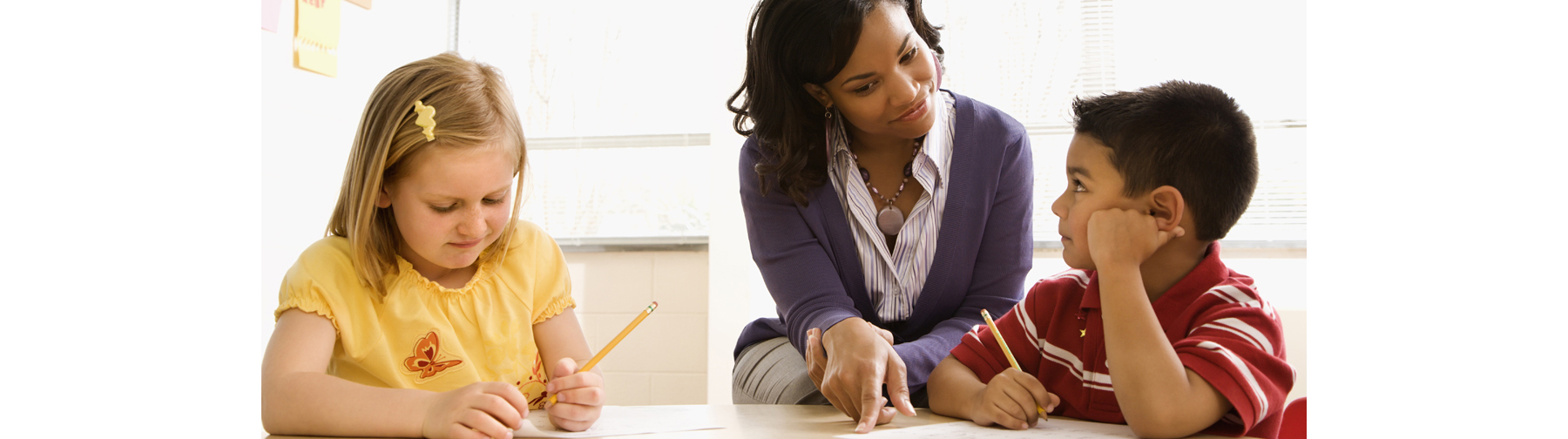young teacher with students