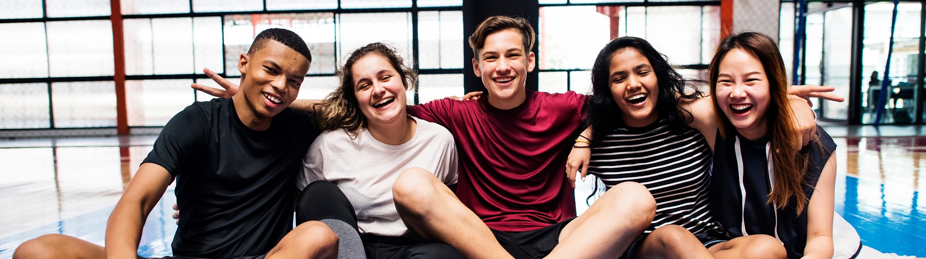 high school students in a gymnasium 